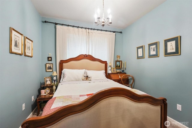 8107 165th Street Ct E, Puyallup, WA 98375 - bedroom featuring baseboards and a chandelier