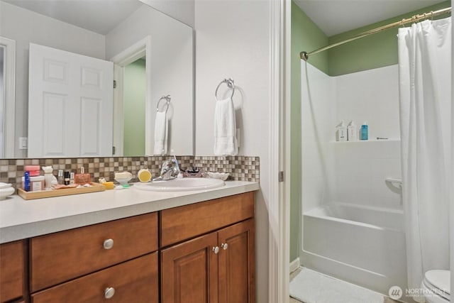 8107 165th Street Ct E, Puyallup, WA 98375 - full bathroom with toilet, vanity, tasteful backsplash, and shower / bathtub combination with curtain