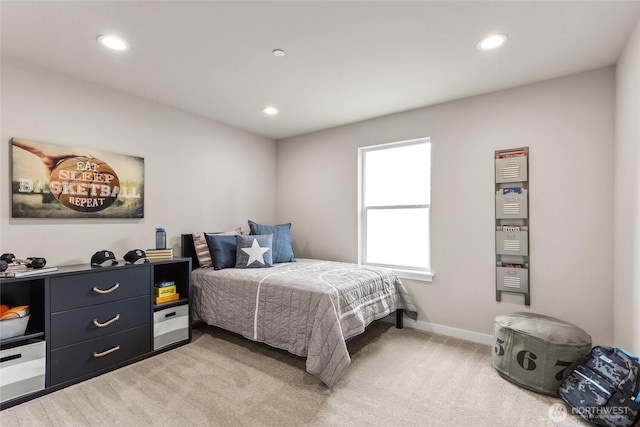 bedroom featuring recessed lighting, light colored carpet, and baseboards