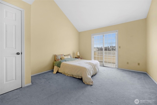 carpeted bedroom with baseboards, lofted ceiling, and access to exterior