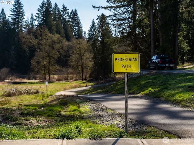 view of road featuring traffic signs