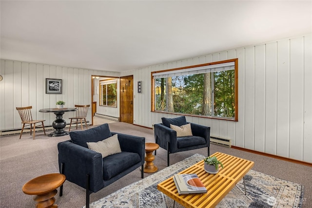 living area with a baseboard radiator and carpet floors