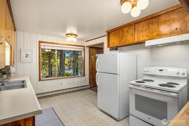 kitchen with white appliances, light floors, a sink, under cabinet range hood, and a baseboard heating unit