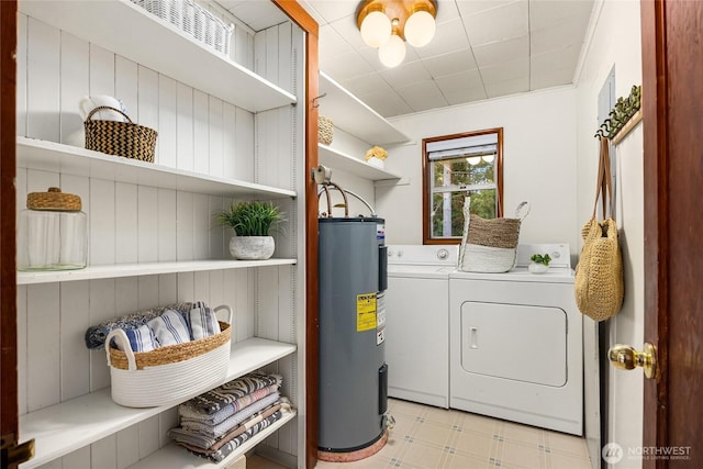 laundry room with laundry area, separate washer and dryer, water heater, and light floors