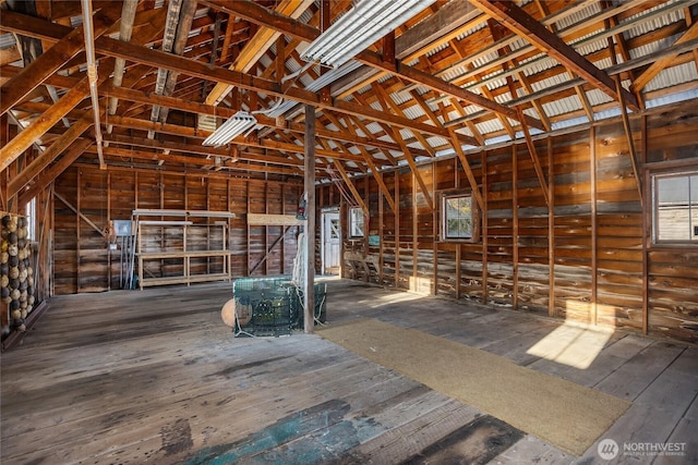 miscellaneous room featuring lofted ceiling