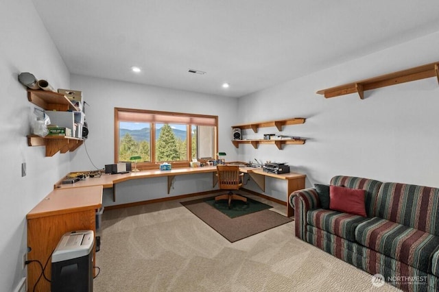 carpeted office featuring visible vents, recessed lighting, baseboards, and built in study area