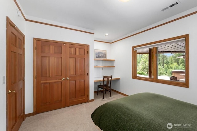 bedroom featuring light carpet, visible vents, baseboards, and ornamental molding