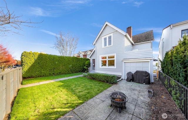 back of property with a patio, an outdoor fire pit, a fenced backyard, a chimney, and a lawn