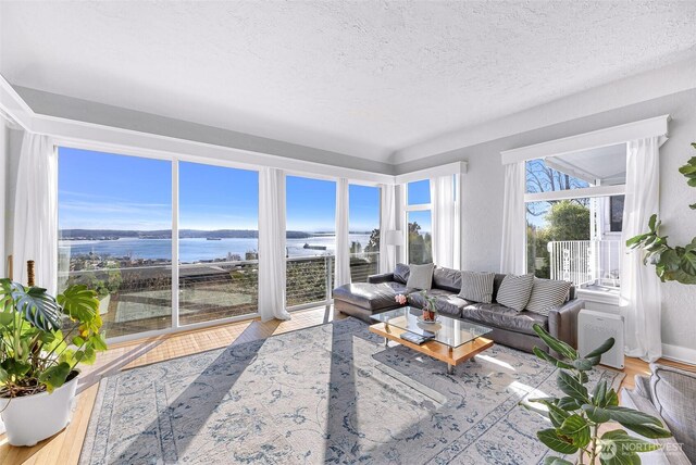 307 W Highland Dr, Seattle, WA 98119 - sunroom with a water view