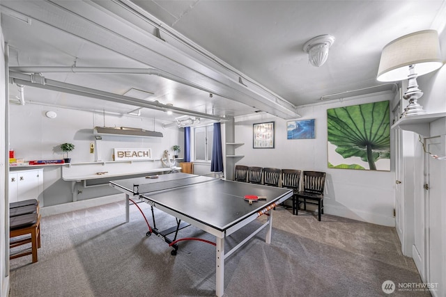 307 W Highland Dr, Seattle, WA 98119 - recreation room featuring baseboards and carpet