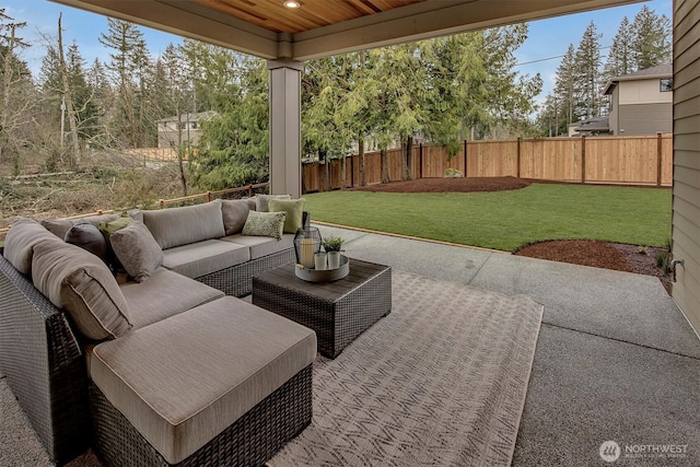 view of patio featuring an outdoor hangout area and a fenced backyard