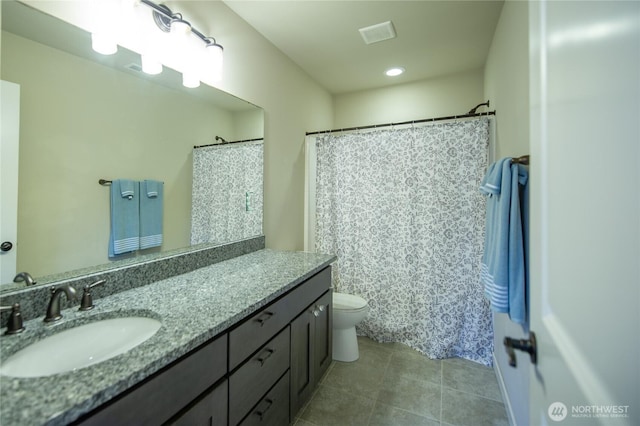 full bath with tile patterned floors, toilet, and vanity