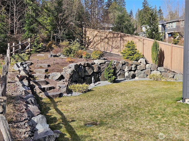 view of yard featuring fence