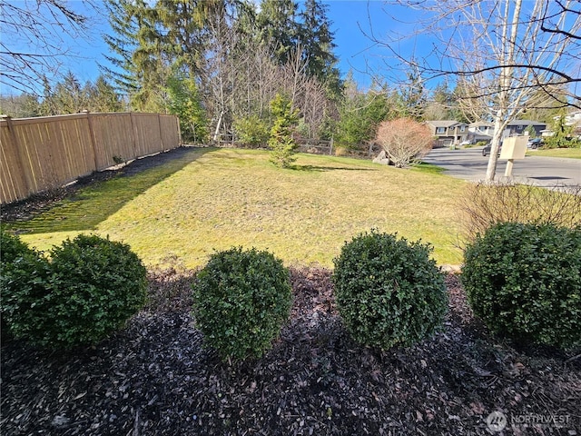 view of yard featuring fence