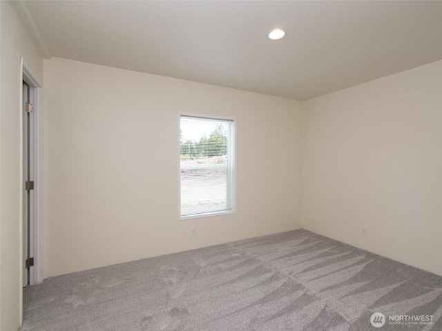 unfurnished room featuring carpet flooring and recessed lighting