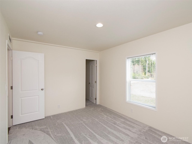 unfurnished bedroom with carpet floors