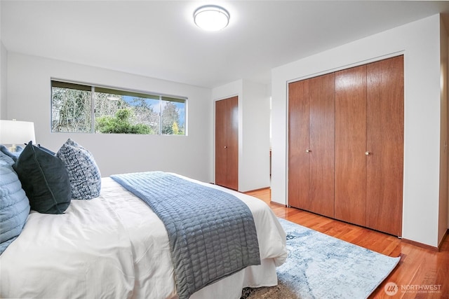 bedroom featuring light wood-style flooring