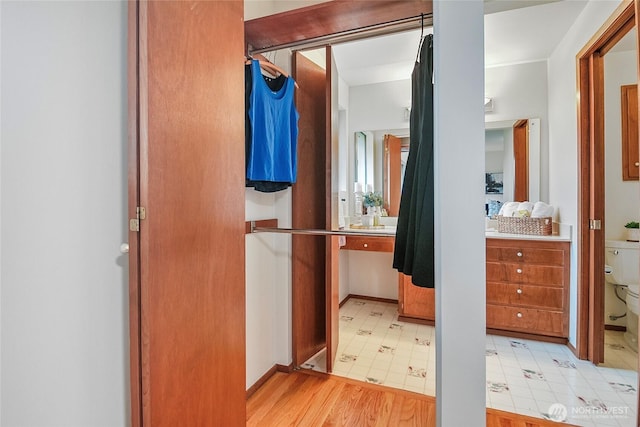 bathroom with vanity, tile patterned floors, and toilet