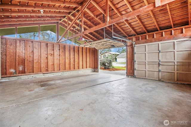 garage featuring a garage door opener