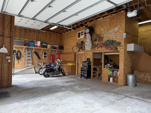 garage featuring a garage door opener