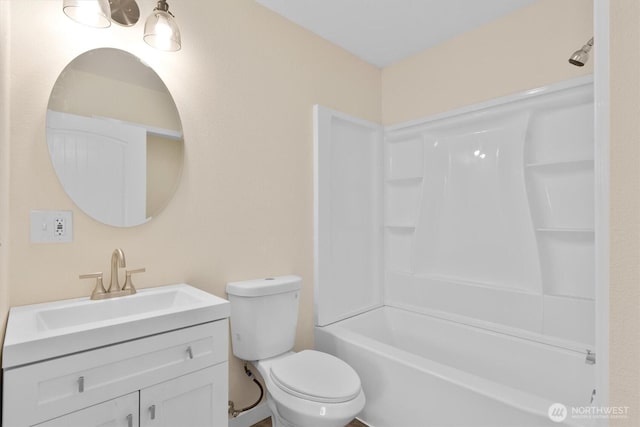 full bath with toilet, vanity, and washtub / shower combination