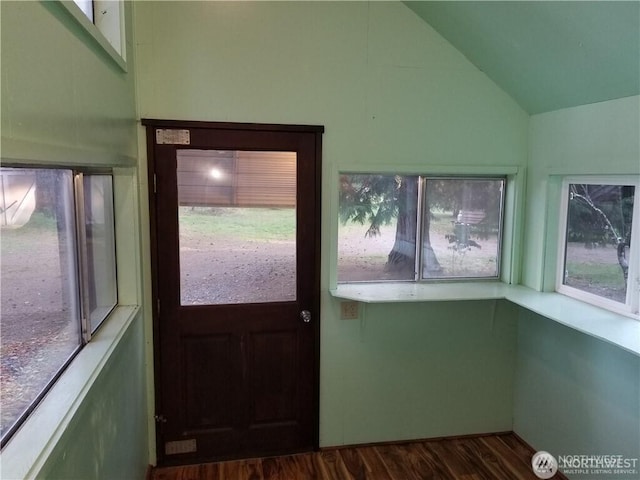 unfurnished sunroom with lofted ceiling