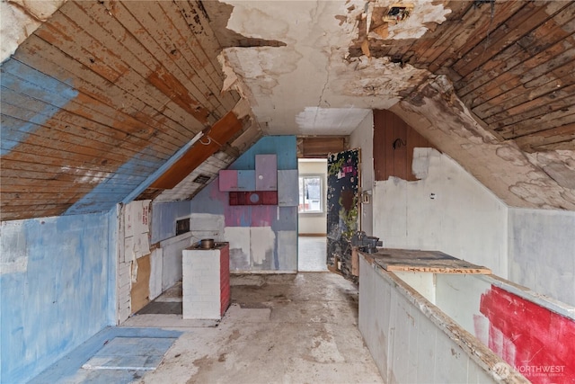 additional living space featuring lofted ceiling and wooden ceiling