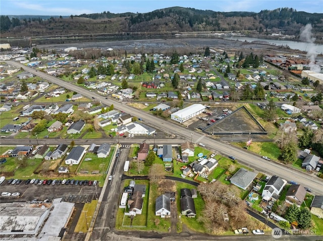 aerial view with a residential view and a water view