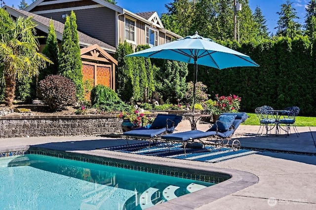 pool featuring a patio area