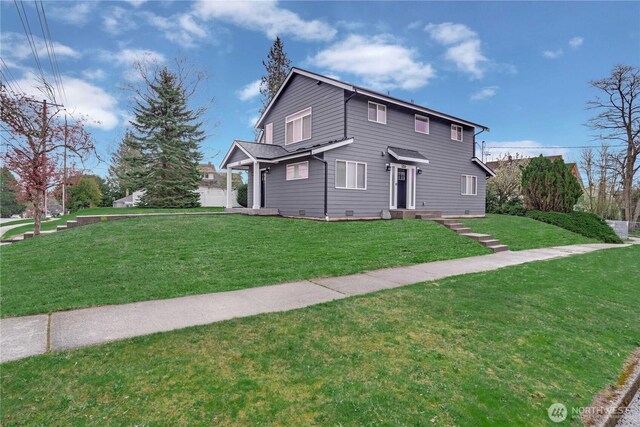 view of front of house with a front lawn