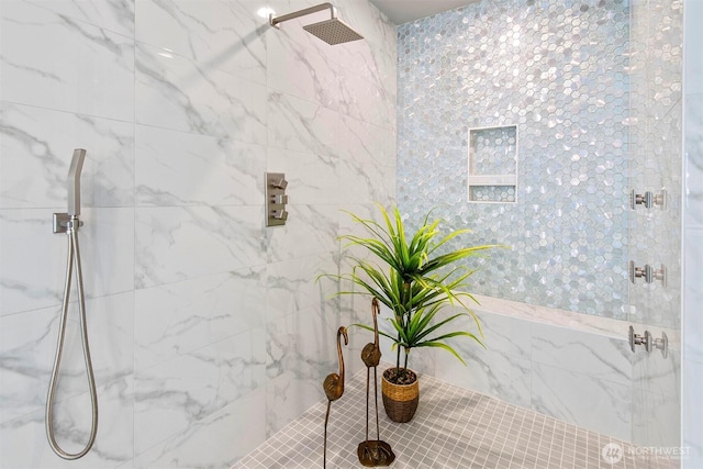 bathroom featuring tiled shower