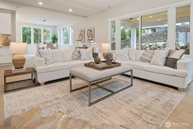 living area featuring recessed lighting and light wood finished floors