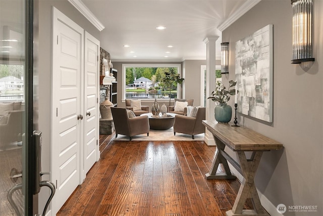 interior space with recessed lighting, dark wood-style floors, baseboards, and ornamental molding