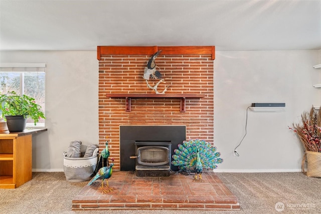 interior details featuring baseboards and carpet floors