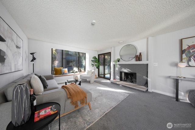 living room featuring baseboards, carpet floors, a textured ceiling, and a brick fireplace