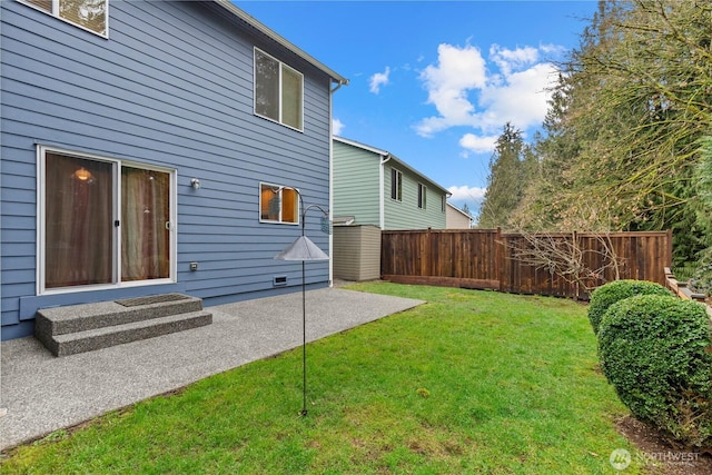 view of yard with a patio area and fence