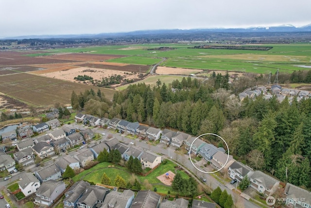 drone / aerial view featuring a rural view and a residential view