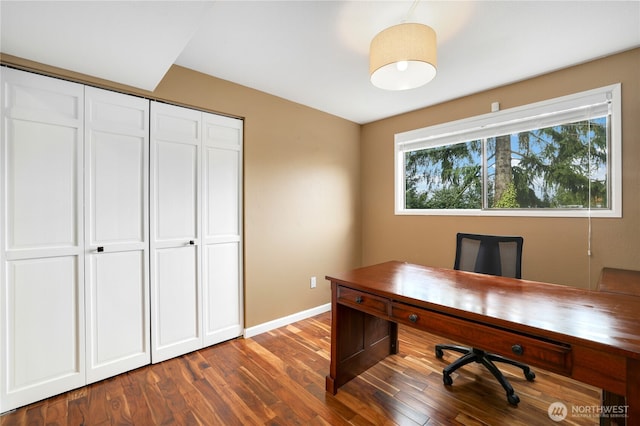 home office featuring dark wood-style floors and baseboards