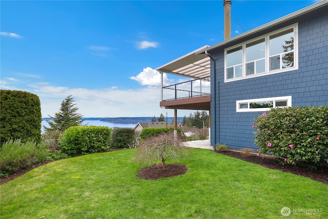 view of yard with a water view