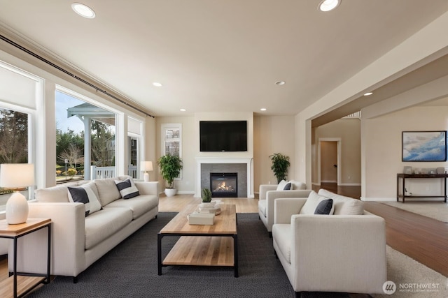 living area featuring recessed lighting and light wood-type flooring