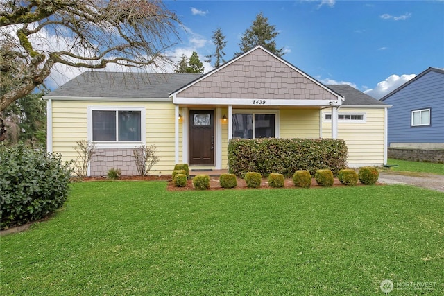 view of front of home with a front yard