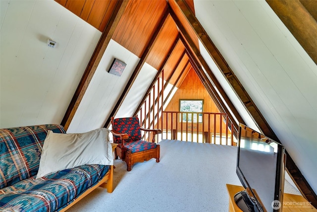 662 Mt Olympus Ave SE, Ocean Shores, WA 98569 - living area with wood walls and carpet flooring