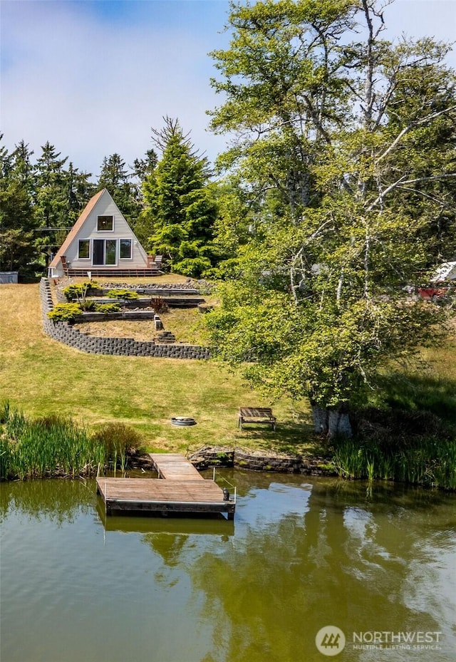 662 Mt Olympus Ave SE, Ocean Shores, WA 98569 - dock with a water view and a yard