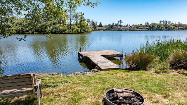 662 Mt Olympus Ave SE, Ocean Shores, WA 98569 - dock area featuring a water view and an outdoor fire pit