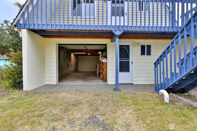 662 Mt Olympus Ave SE, Ocean Shores, WA 98569 - back of property featuring a garage and stairs