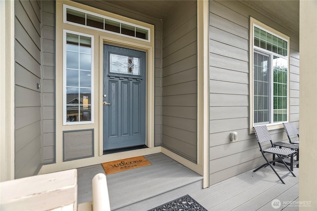 doorway to property featuring a porch