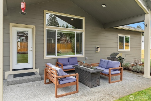 view of patio with outdoor lounge area and a grill