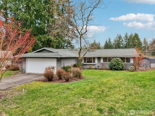 ranch-style house with driveway, a front lawn, and an attached garage