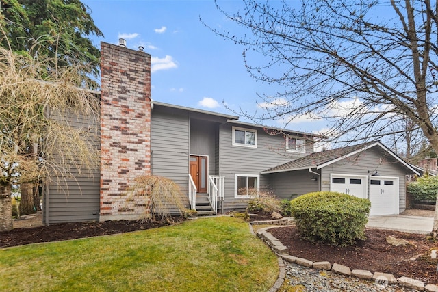 view of front of property featuring a front lawn, driveway, a chimney, and a garage