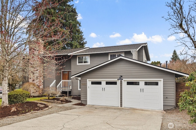 view of front facade with a garage and driveway